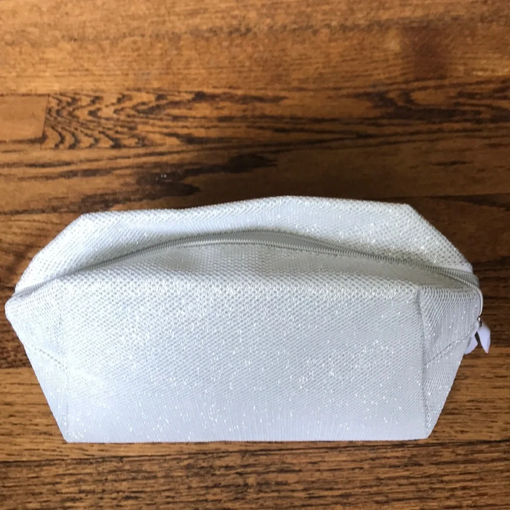 NWOT Orlane Paris silver sparkly lined bag